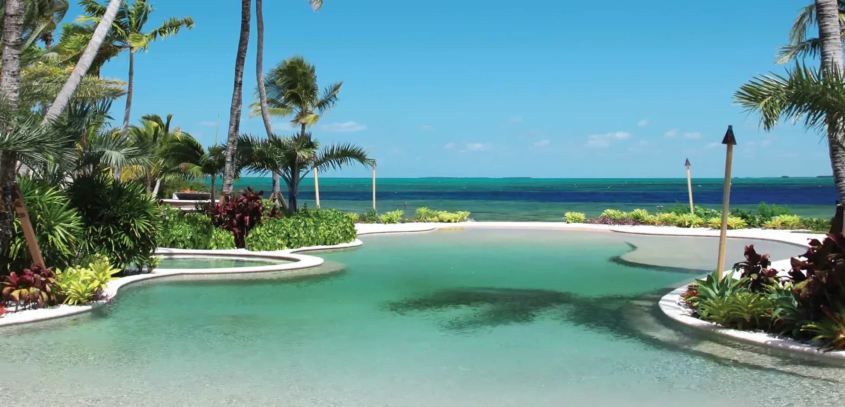 Pool finished in PebbleTec Sandy Beach (PTI photography)