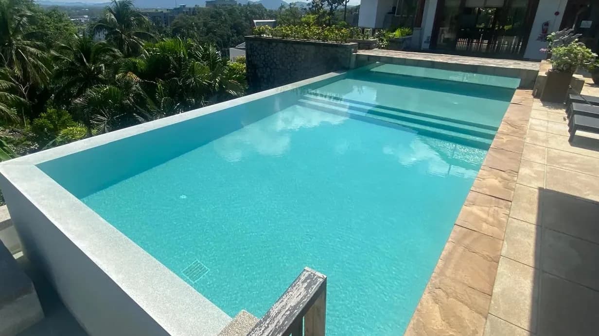 Hillside infinity pool after renovation