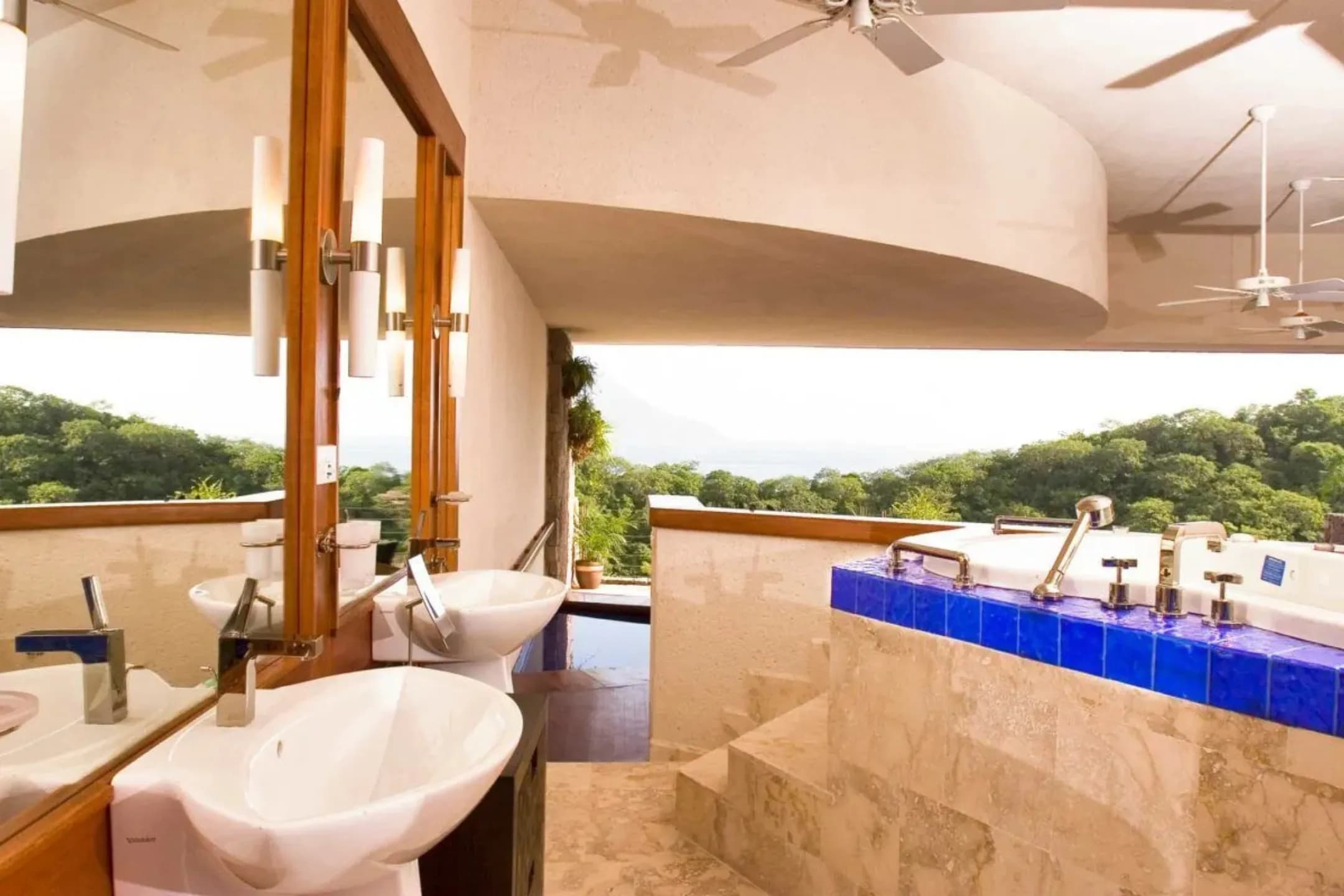 Spa bath lined with deep blue Lightstreams glass tile